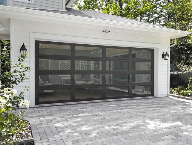 Palm Bay Garage Door Repair design specialist presenting custom garage door options to Palm Bay homeowner