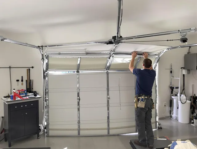 Palm Bay Garage Door Repair specialist performing precise section replacement on Palm Bay garage door