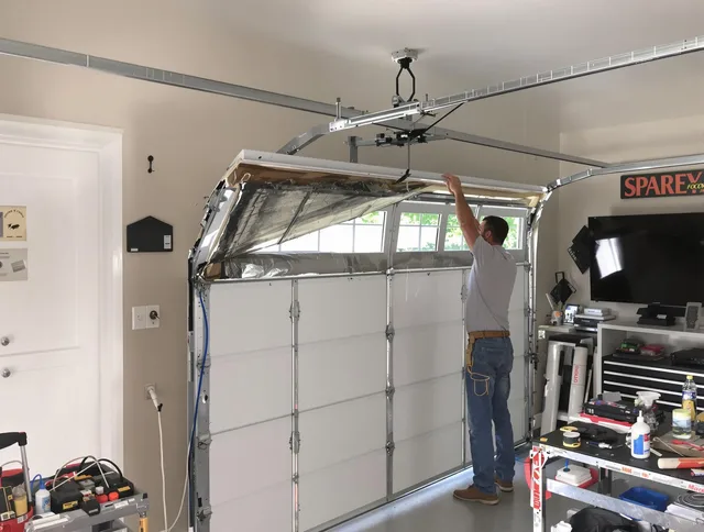 Garage door section replacement by Palm Bay Garage Door Repair in Palm Bay