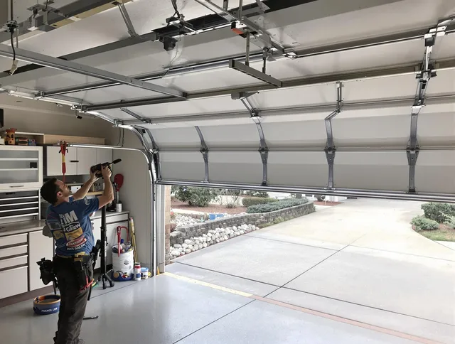 Garage door track repair service by Palm Bay Garage Door Repair in Palm Bay
